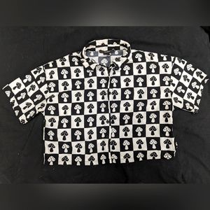 Whimsical black and white cropped shirt with mushrooms
